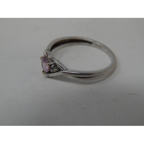 84 - 9ct White Gold Ring together with a white metal gem set ring.