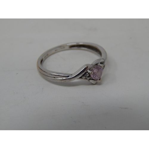 84 - 9ct White Gold Ring together with a white metal gem set ring.