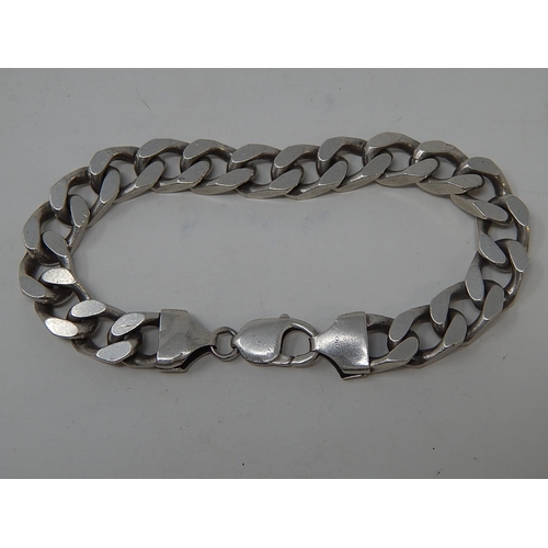 86 - Three Silver Bracelets together with a Silver Chain. 192g