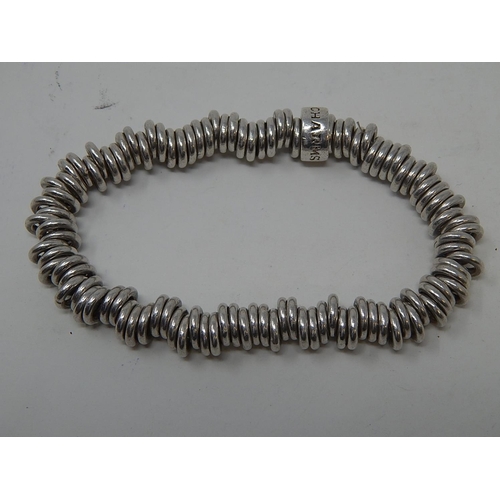 86 - Three Silver Bracelets together with a Silver Chain. 192g