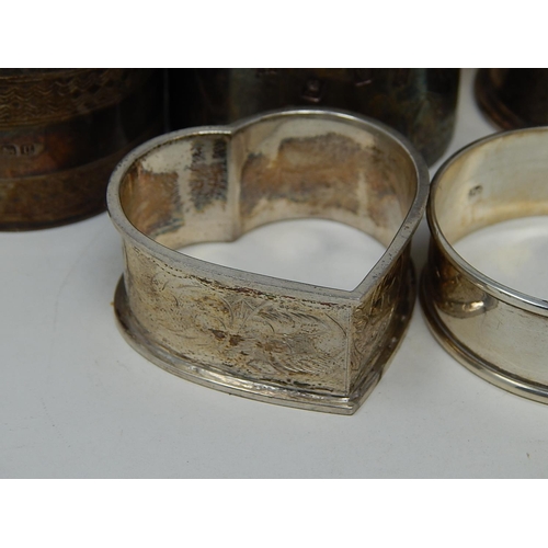 22 - Eleven Silver Hallmarked Napkin Rings: Weight 270g