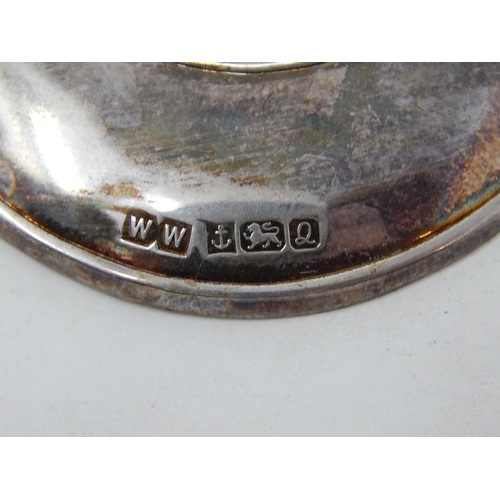 27 - Silver Hallmarked Crescent Shaped Decanter Label.