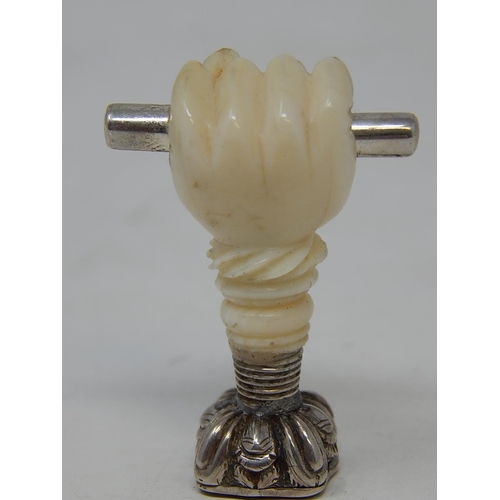 32 - Victorian Silver & Ivory Desk Seal with carved ivory hand holding a silver baton. The red matrix sea... 