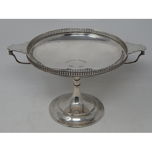 44 - Arts & Crafts Silver Tazza with pierced gallery & stylised twin handles sitting on a conical foot. H... 