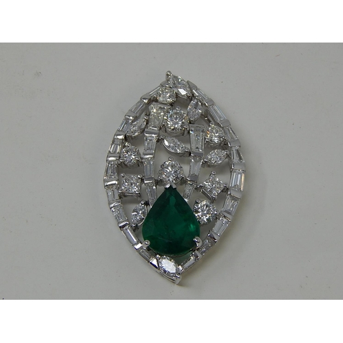 100 - Emerald and diamond pendant, marquise shaped openwork pendant set with a pear cut emerald at the bot... 