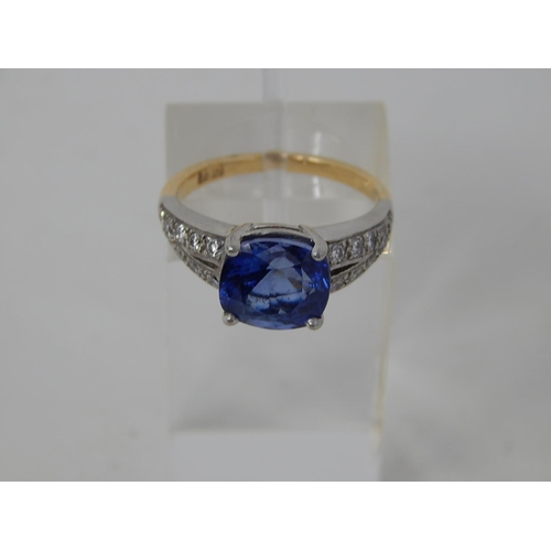 112 - Sapphire and diamond dress ring, central cushion cut sapphire weighing an estimated 3.00cts, four cl... 