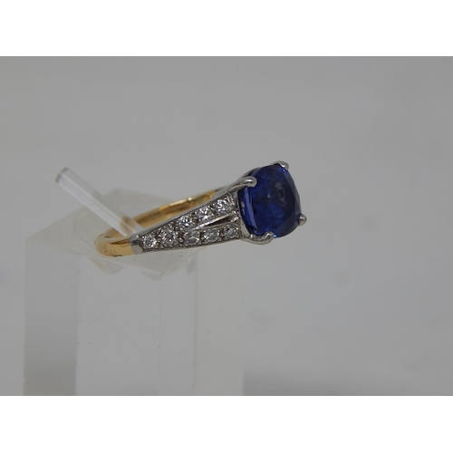 112 - Sapphire and diamond dress ring, central cushion cut sapphire weighing an estimated 3.00cts, four cl... 