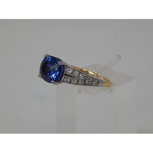 112 - Sapphire and diamond dress ring, central cushion cut sapphire weighing an estimated 3.00cts, four cl... 