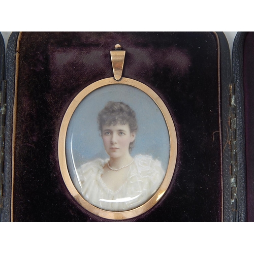 137 - Victorian Brooch / Pendant. The Painted Miniature of a pretty young Lady in a white dress wearing pe... 