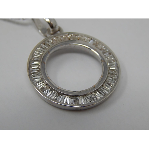 139 - 18ct White Gold Pendant inset with a circle of Baguette Cut Diamonds on an 18ct White Gold Chain. Bo... 