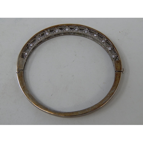 144 - Silver Hinged Bangle set with white stones: Internal diameter 5.5cm: Presented in Fitted Case.