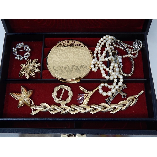 145 - A Collection of Costume Jewellery together with Red Cross Medals in a Fitted Jewellery Box with key.