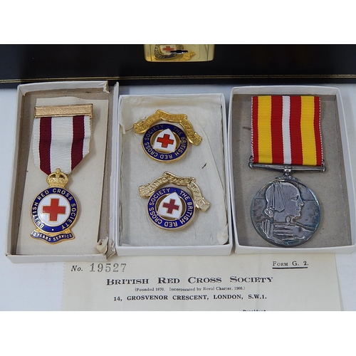 145 - A Collection of Costume Jewellery together with Red Cross Medals in a Fitted Jewellery Box with key.