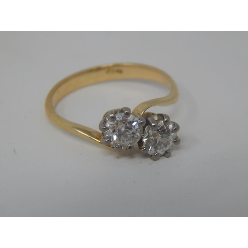 146 - 18ct Gold Diamond Cross Over Ring Set with 2 Old Cut Diamonds Assessed at 0.65 & 0.63ct. Colour J-K:... 