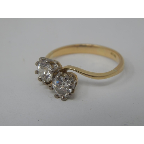 146 - 18ct Gold Diamond Cross Over Ring Set with 2 Old Cut Diamonds Assessed at 0.65 & 0.63ct. Colour J-K:... 