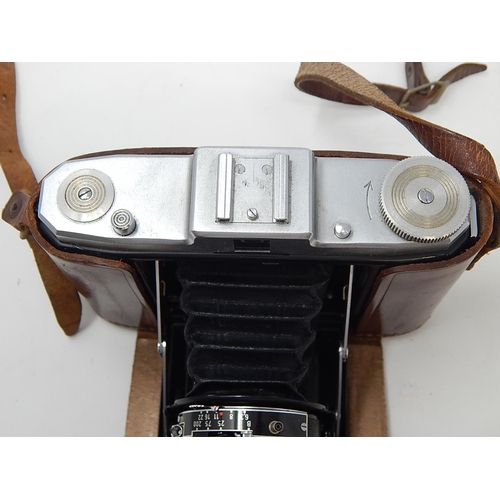 306 - Zeiss Ikon Nettar Camera together with two Kodak Cameras, all in fitted cases.