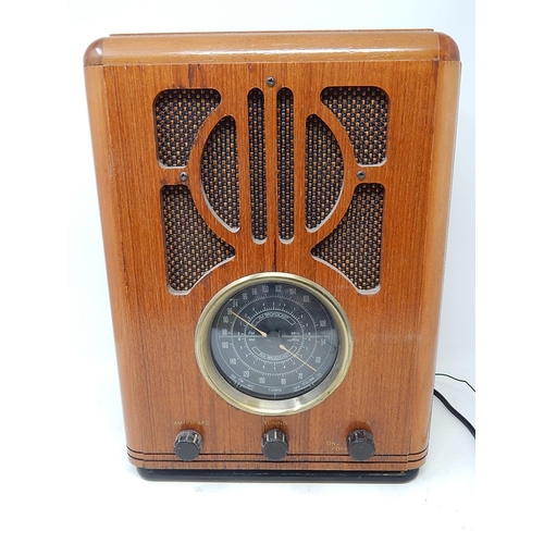 322 - Wooden Cased Electric Radio. 33cm high