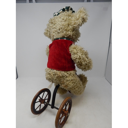 363 - Special Collectors Edition Teddy Bear riding a three wheeled bicycle. 44cm high x 33cm wide