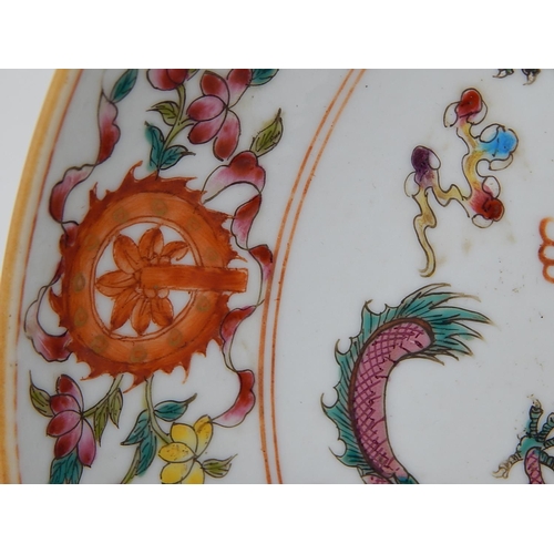 387 - WITHDRAWN: Chinese porcelain shallow dish, hand painted in the famille rose palette with objects and... 