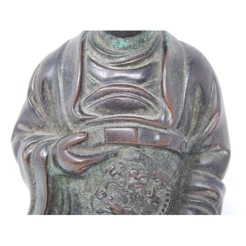 390 - Chinese bronze study of a seated emperor, character marks to the reverse, 38.5cm high