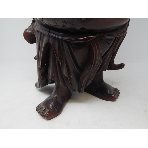 392 - Large Chinese hardwood carved laughing Buddah table lamp. Height 56cm