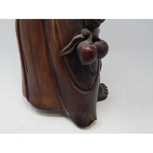 392 - Large Chinese hardwood carved laughing Buddah table lamp. Height 56cm