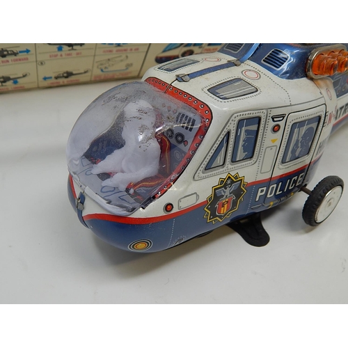 412 - 1960's Tin Plate Super Flying police Helicopter from the TV series Highway Patrol (boxed)