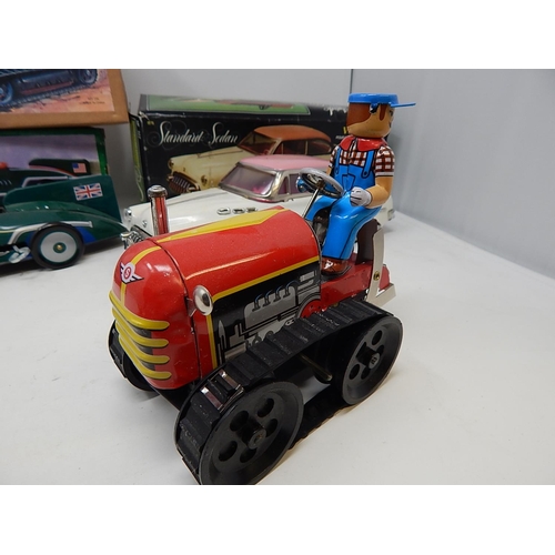 413 - Three Vintage Tin Plate Toys: Standard Sedan: British Record Racer: Clockwork Tractor: All Boxed