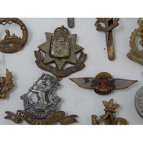 416 - Quantity of Military Cap Badges etc including a silver & Enamel RAF brooch