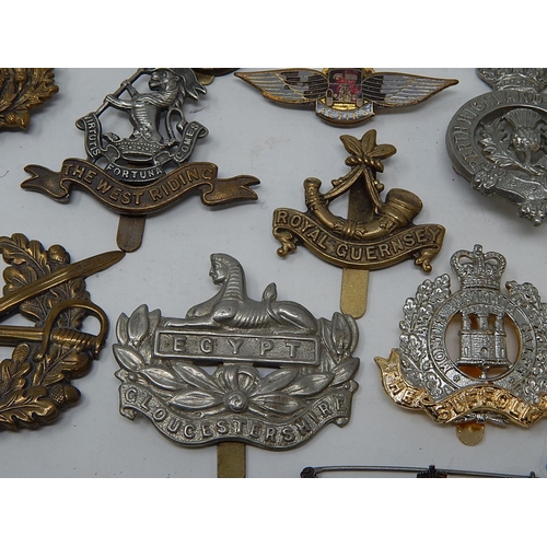 416 - Quantity of Military Cap Badges etc including a silver & Enamel RAF brooch