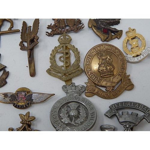 416 - Quantity of Military Cap Badges etc including a silver & Enamel RAF brooch