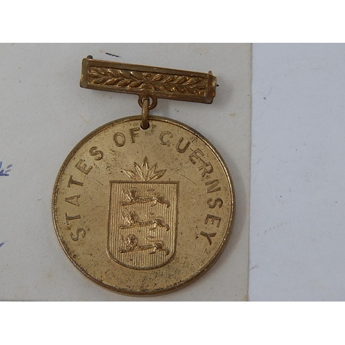 419 - Guernsey Liberation from German Occupation Medal 1945 together with the 1st civil mail since German ... 