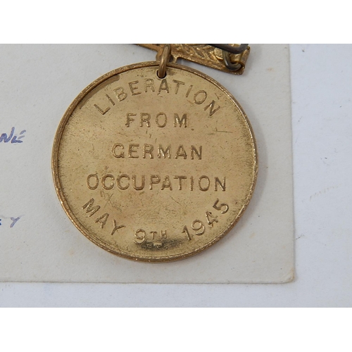 419 - Guernsey Liberation from German Occupation Medal 1945 together with the 1st civil mail since German ... 