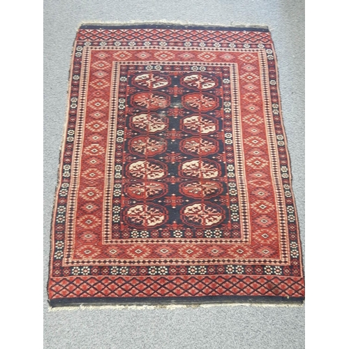 423 - Vintage Rug with Red Ground & Medallions: Size: 130cm x 95cm