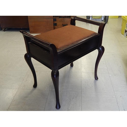 700 - WITHDRAWN: Early 20th century mahogany piano stool with lift up seat complete with sheet music. 58cm... 