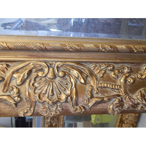 704 - WITHDRAWN: Large French Gilt Mirror with Bevelled Plate. The frame with shell & foliate decoration. ... 