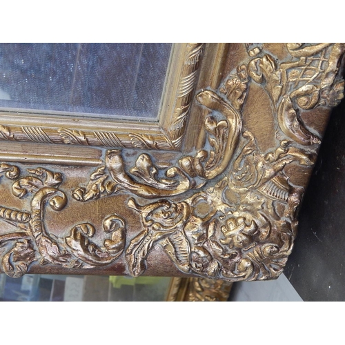 704 - WITHDRAWN: Large French Gilt Mirror with Bevelled Plate. The frame with shell & foliate decoration. ... 