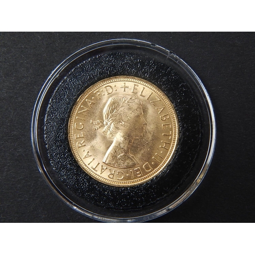 601 - Elizabeth II Sovereign 1957, about as struck