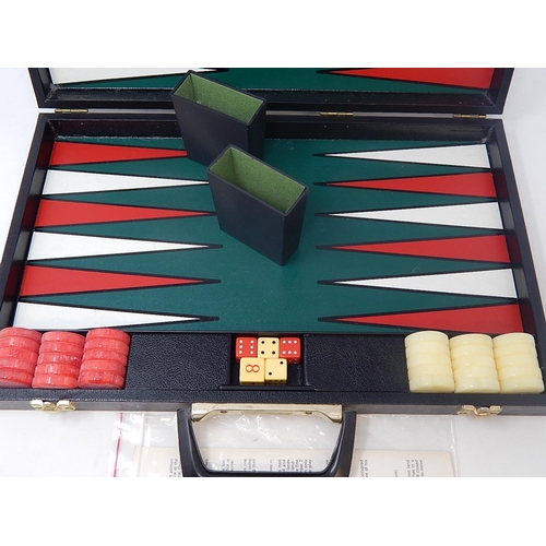 426 - Complete Backgammon Set within a fitted case with Instructions.