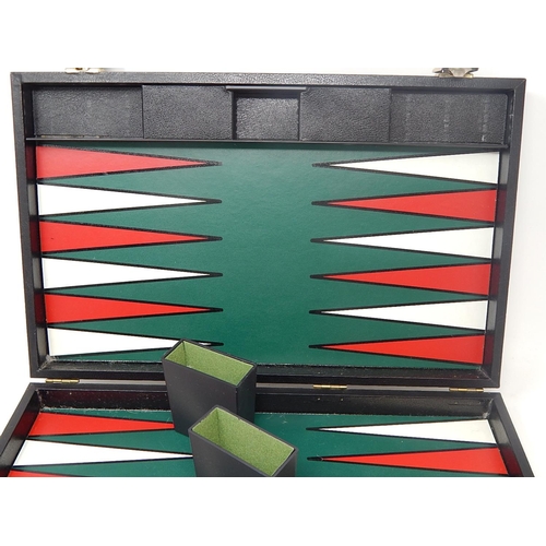 426 - Complete Backgammon Set within a fitted case with Instructions.