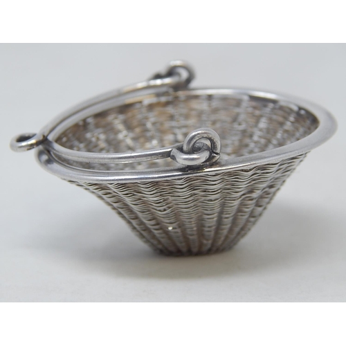 63 - Chinese Silver Swing Handled Basket: Measures 4cm x 3.5cm