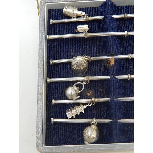 65 - Set of 6 Oriental Silver Straw/ Cocktail/ Stirring Spoons each with an attached charm. Length of eac... 