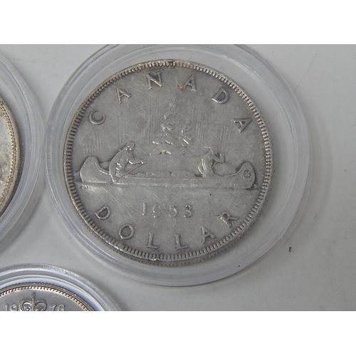 685 - COINS: 1953 Canada Silver Dollar x 2: 1975 Canada Silver Dollar: 1976 Canada 50 Cents x 2.