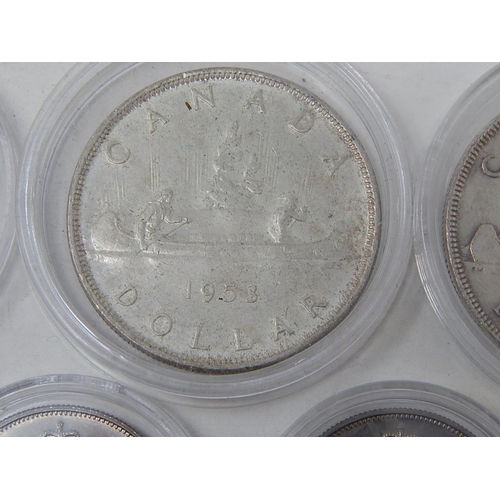 685 - COINS: 1953 Canada Silver Dollar x 2: 1975 Canada Silver Dollar: 1976 Canada 50 Cents x 2.