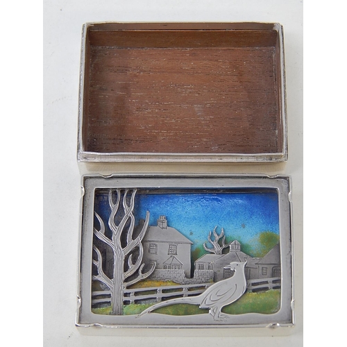 87 - ANTHONY HAWKSLEY (1921-1991): Silver & Enamel Box with Pheasant & Trees in an Enamel Foreground with... 