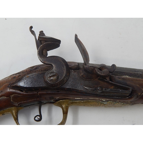 453 - 18th Century Flintlock Pistol (possibly Arabic/Turkish) with Walnut Stock & brass mounts & fittings:... 