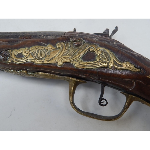 453 - 18th Century Flintlock Pistol (possibly Arabic/Turkish) with Walnut Stock & brass mounts & fittings:... 