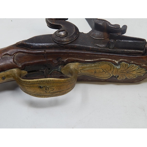 453 - 18th Century Flintlock Pistol (possibly Arabic/Turkish) with Walnut Stock & brass mounts & fittings:... 