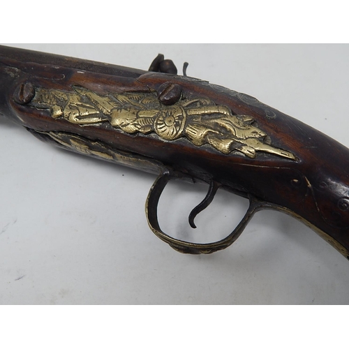 454 - 18th Century Turkish Flintlock Pistol with brass mounts & fittings: Condition: Poor: Measures 39cm L... 