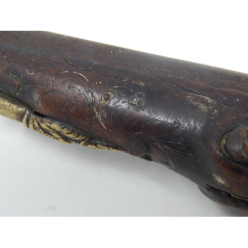 454 - 18th Century Turkish Flintlock Pistol with brass mounts & fittings: Condition: Poor: Measures 39cm L... 